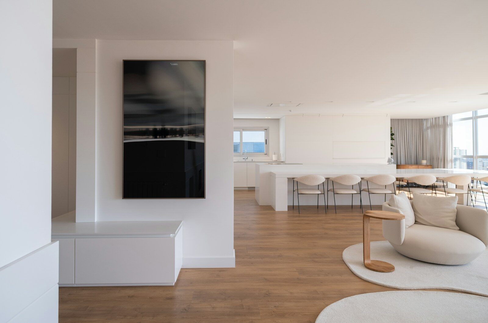 Modern living room with abstract art and minimalist furniture